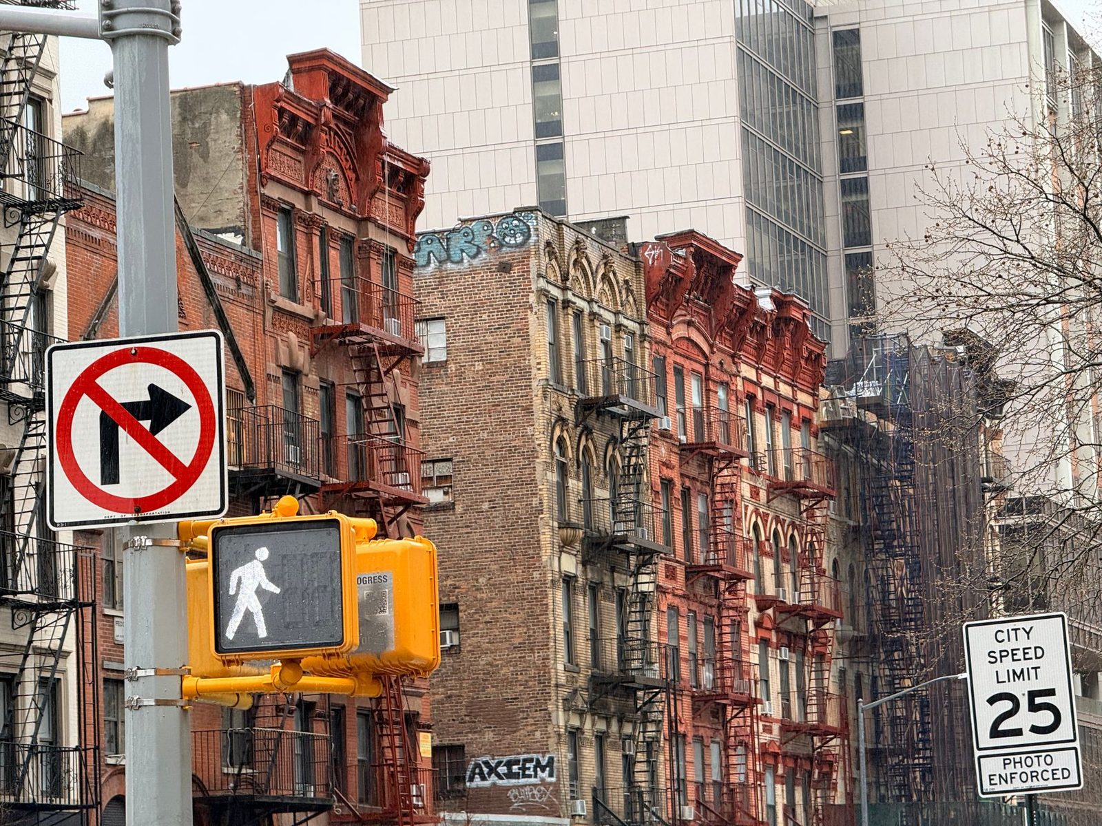 Brick facades and fire escapes on a New York street
